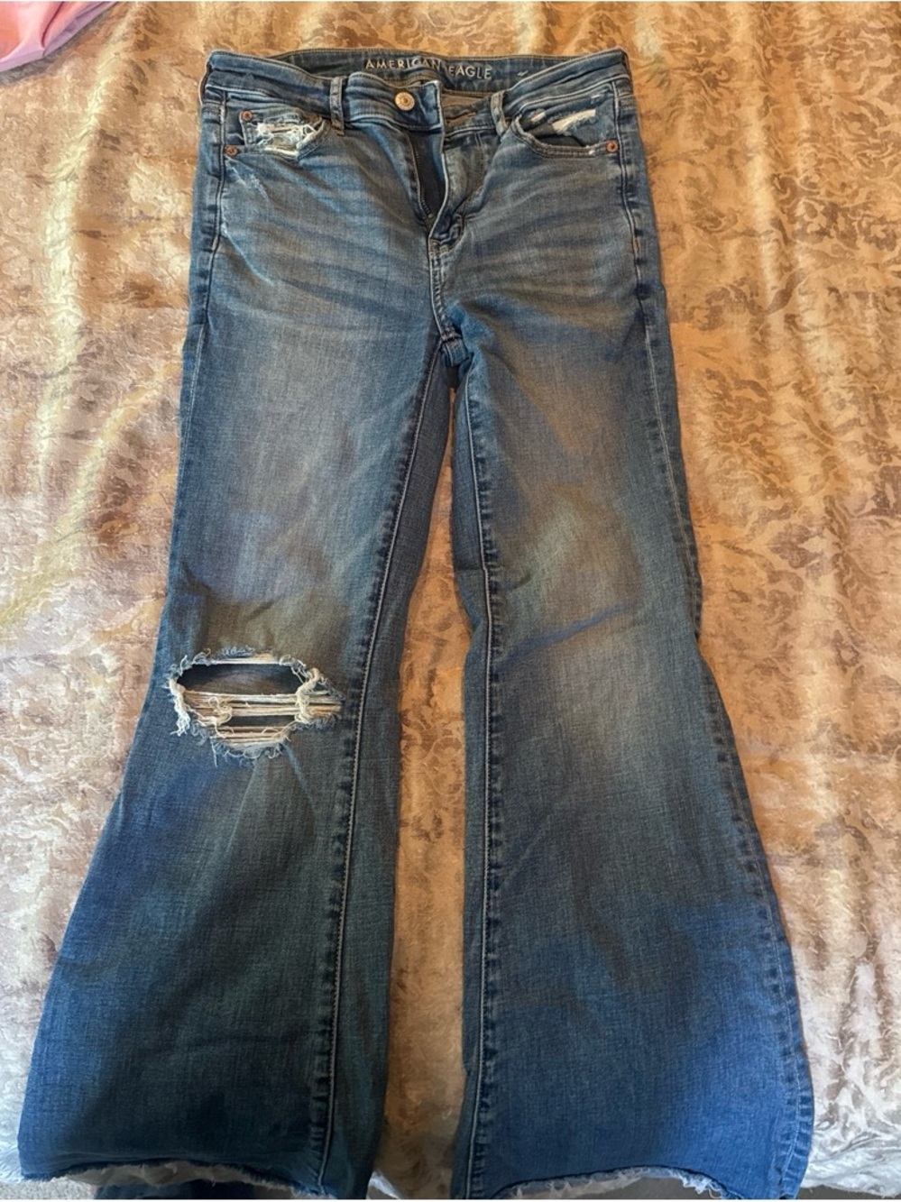 American Eagle Outfitters Women's Medium Blue Flare Jeans with Knee Distress